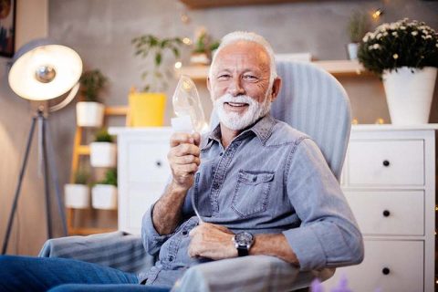 happy-senior-man-using-oxygen