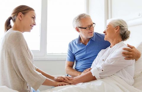 caregiver comforting person with dementia