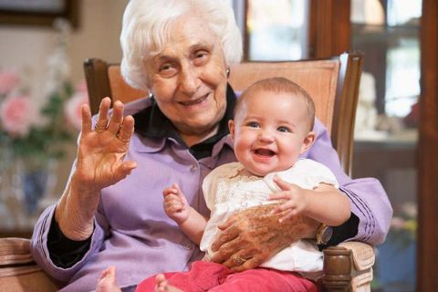 grandparent-holding-grandchild-elderspeak