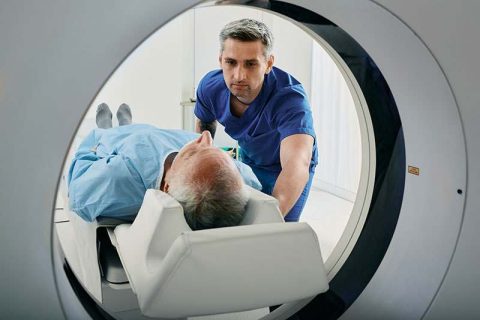 senior-man-getting-Cat-scan-with-technician