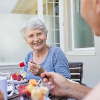 senior lady eating lunch