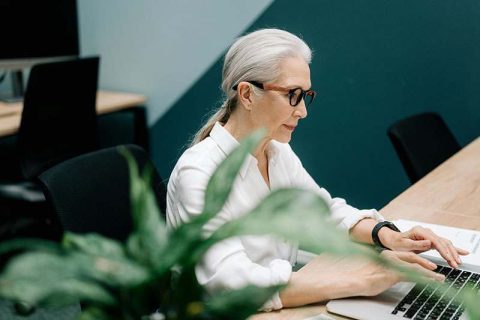 adult lady working on computer