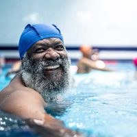 senior-man-exercising-in-pool