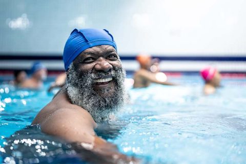 senior-man-exercising-in-pool